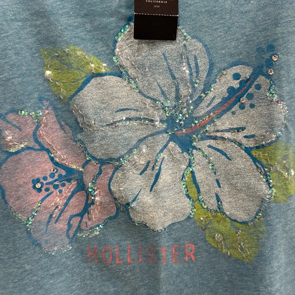New! Hollister Aqua Blue Sequin & Glitter Floral Print Short Sleeve Tee *Flaw* L - Picture 2 of 10
